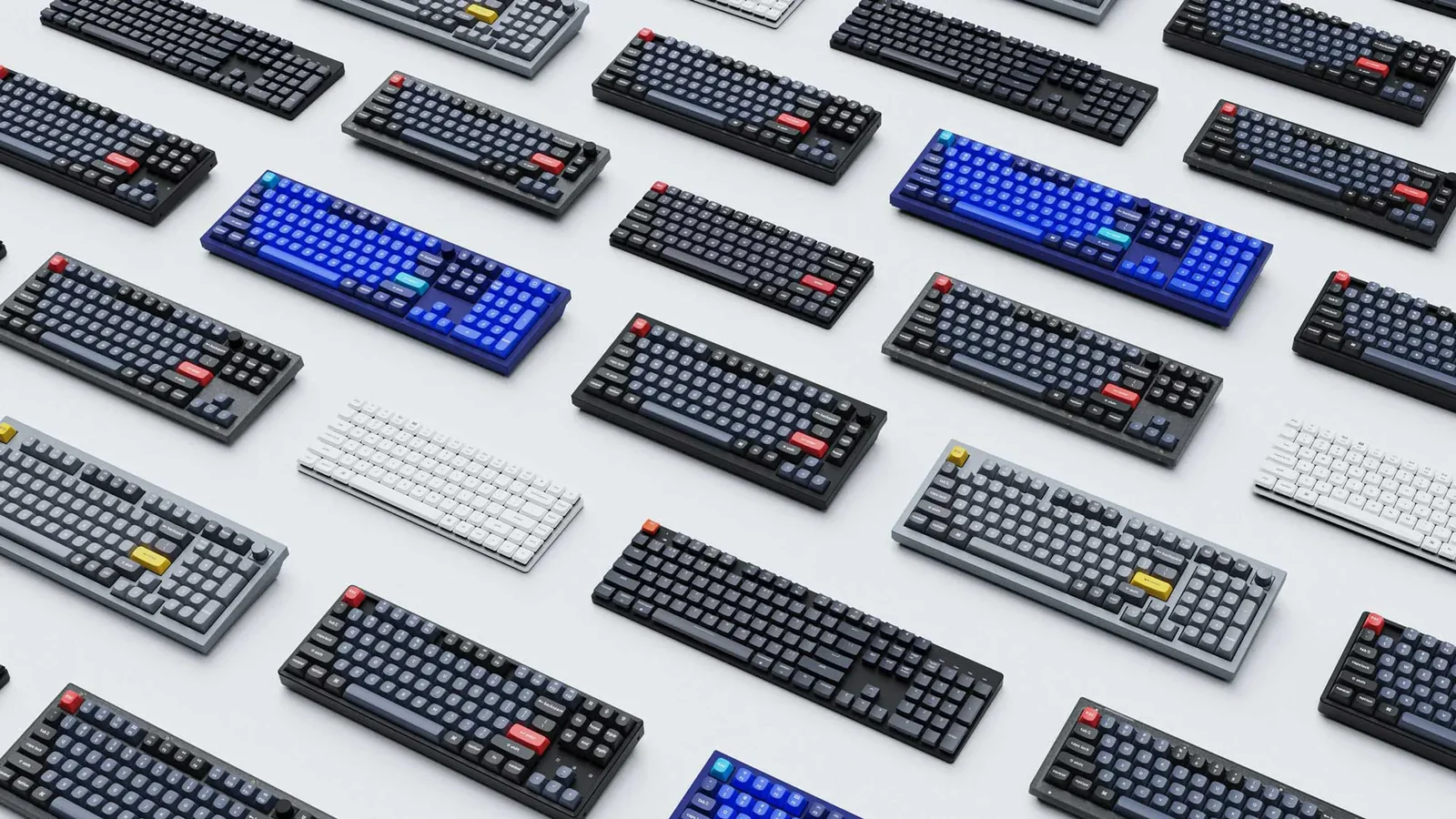異なるサイズと配列のキーボードが並ぶ俯瞰イメージ