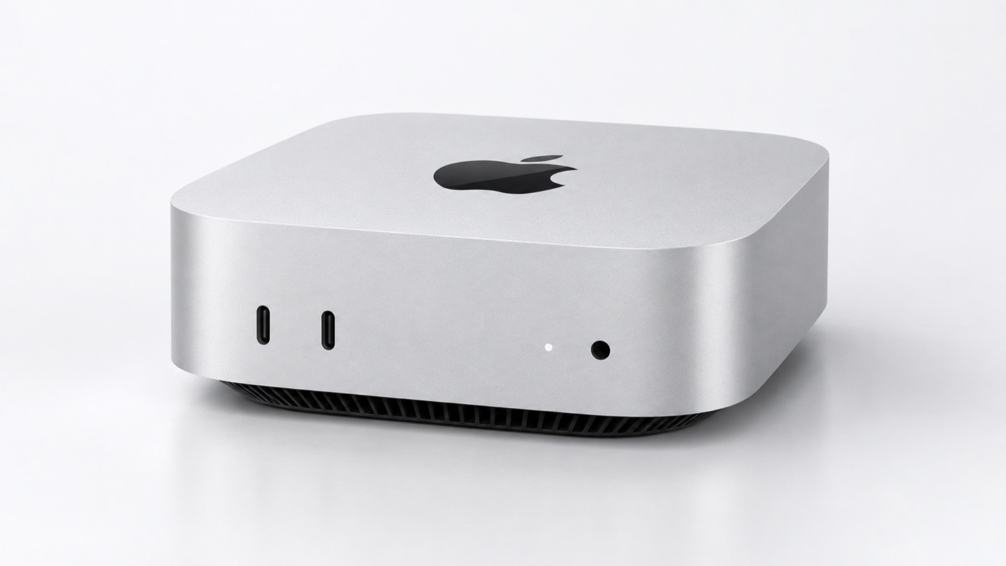 シルバーのMac miniを斜め上から表現したAI生成CG。天面のロゴと前面の端子が見える。